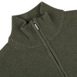 Close-up of the Moss Green Wool Cashmere Quarter Zip by Morgano, showcasing its ribbed knit material and metal zipper, epitomizing the quality expected from an Italian knitwear specialist.