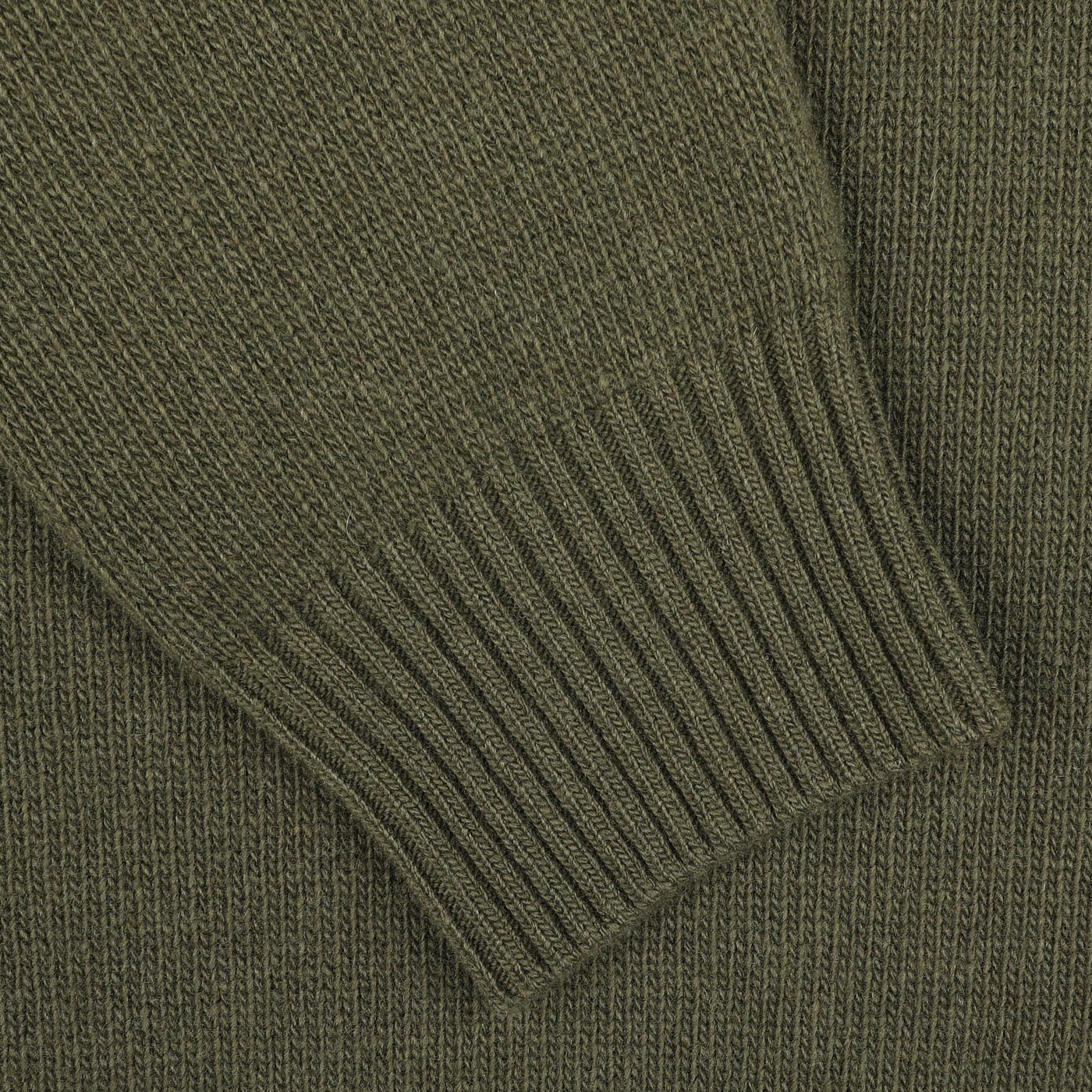 Close-up image of the Moss Green Wool Cashmere Quarter Zip by Morgano, featuring a ribbed cuff detail on the sleeve that showcases the fine craftsmanship typical of Italian knitwear.