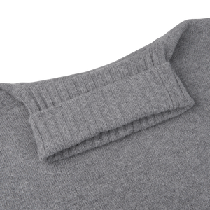 A close up of a Morgano Grey Heavy Wool Cashmere Rollneck, crafted by an Italian knitwear specialist using merino wool and cashmere.