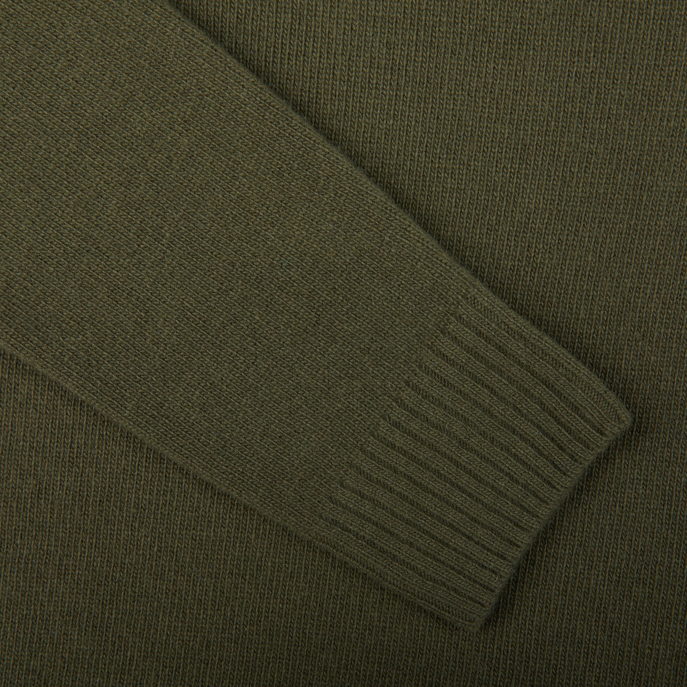 A close up of a Morgano Moss Green Heavy Wool Cashmere Rollneck sweater with a rollneck.