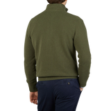 The back view of a man wearing a Morgano Moss Green Wool Cashmere Quarter-Zip Sweater.
