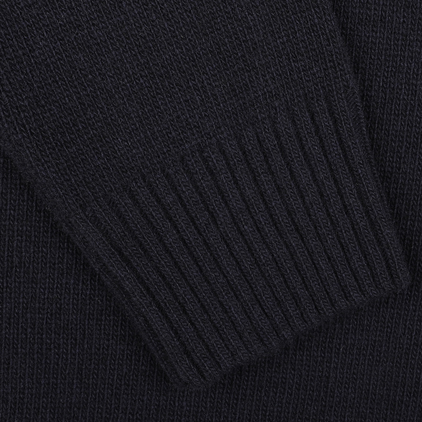 Close-up of a sleeve with ribbed cuff detail on the Navy Blue Heavy Wool Cashmere Rollneck by Morgano, crafted from soft merino wool.