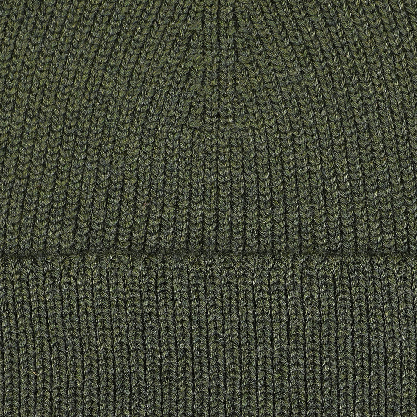 Close-up image of the Khaki Green Merino Wool Ara Beanie from Nitto, showcasing the detailed ribbed texture of the fabric.