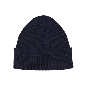 Close-up image of a Marine Blue Merino Wool Ara Beanie, crafted by Nitto.