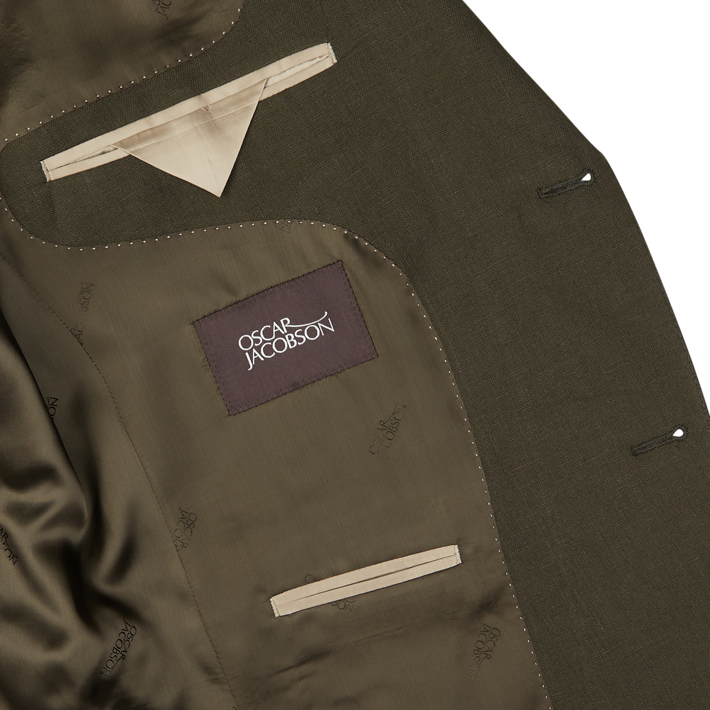 Close-up of a Green Leaf Pure Linen Suit jacket by Oscar Jacobson with label and inside pockets.
