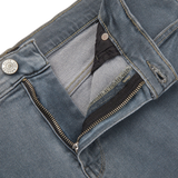A close up of a pair of Paige Grey-Blue Cotton Stretch Lennox jeans with a zippered pocket.