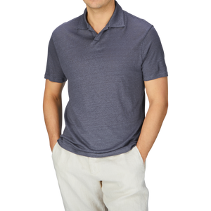 A man wearing a Paige Grey Blue Linen Capri Collar Polo Shirt and khaki pants.