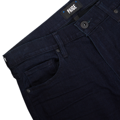 Paige Inkwell Blue Cotton Transcend Normandie jeans close-up displaying waistband and pockets.