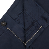 Close-up of Navy Blue Cotton Blend Paige Phillips Shorts with a zipper and button detail.