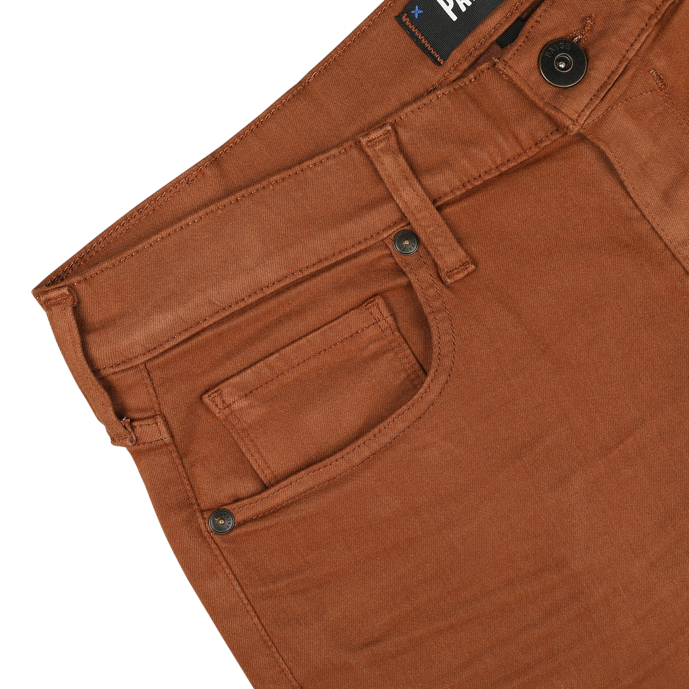 Close-up image of the waistband and pockets of Paige's Rust Brown Cotton Transcend Federal Slim Jeans on a white background. These comfortable fit pants feature a button and a visible brand label near the waistband.