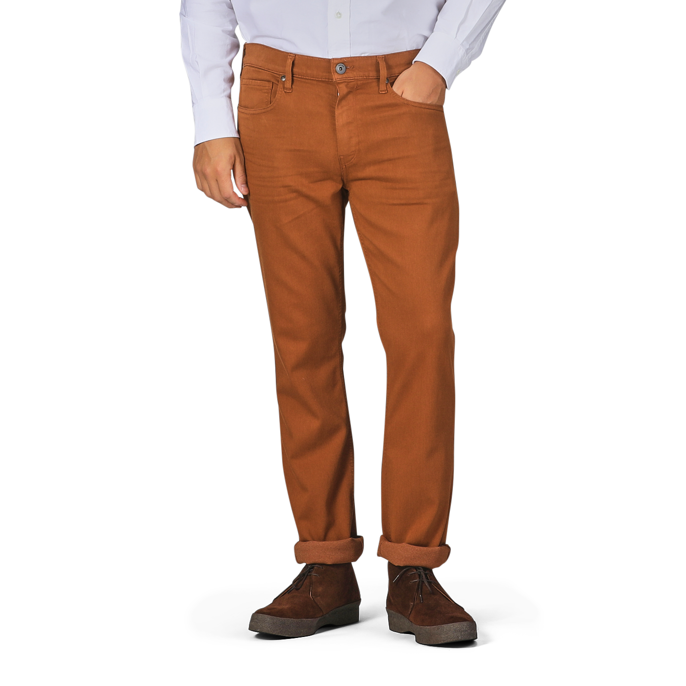 A person wearing a white shirt and Paige Rust Brown Cotton Transcend Federal Slim Jeans rolled up at the cuffs, paired with brown shoes. The head is not visible in the image, but the comfortable fit of the outfit suggests ease and style.