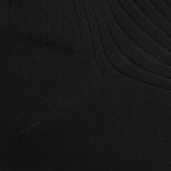 Close-up of Black Egyptian Cotton Isle Danvers Ankle Socks by Pantherella, featuring a ribbed texture and subtle seam detail, akin to fine cotton lisle yarn in men's dress socks.