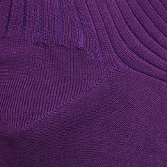 Close-up of Purple Egyptian Cotton Lisle Danvers Ankle Socks by Pantherella, showcasing the intricate rib knit patterns and texture typical of rib knit. This material highlights the elegant structure crafted with cotton lisle yarn, often found in men's dress socks.