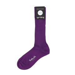 The Purple Egyptian Cotton Lisle Danvers Ankle Sock by Pantherella showcases premium quality, epitomizing men's dress socks with its ribbed texture.