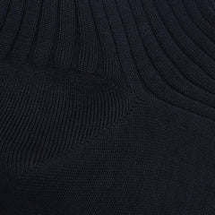 A close-up of Navy Egyptian Cotton Lisle Danvers Ankle Socks by Pantherella, highlighting black ribbed knit fabric crafted with delicate cotton lisle yarn, showing diagonal stitching and texture.