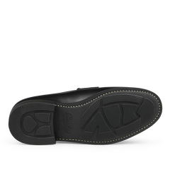 The image displays the sole of Paraboot's Black Leather Adonis Rubber Sole Loafers, highlighting a textured pattern with edge stitching, exemplifying Paraboot's craftsmanship.