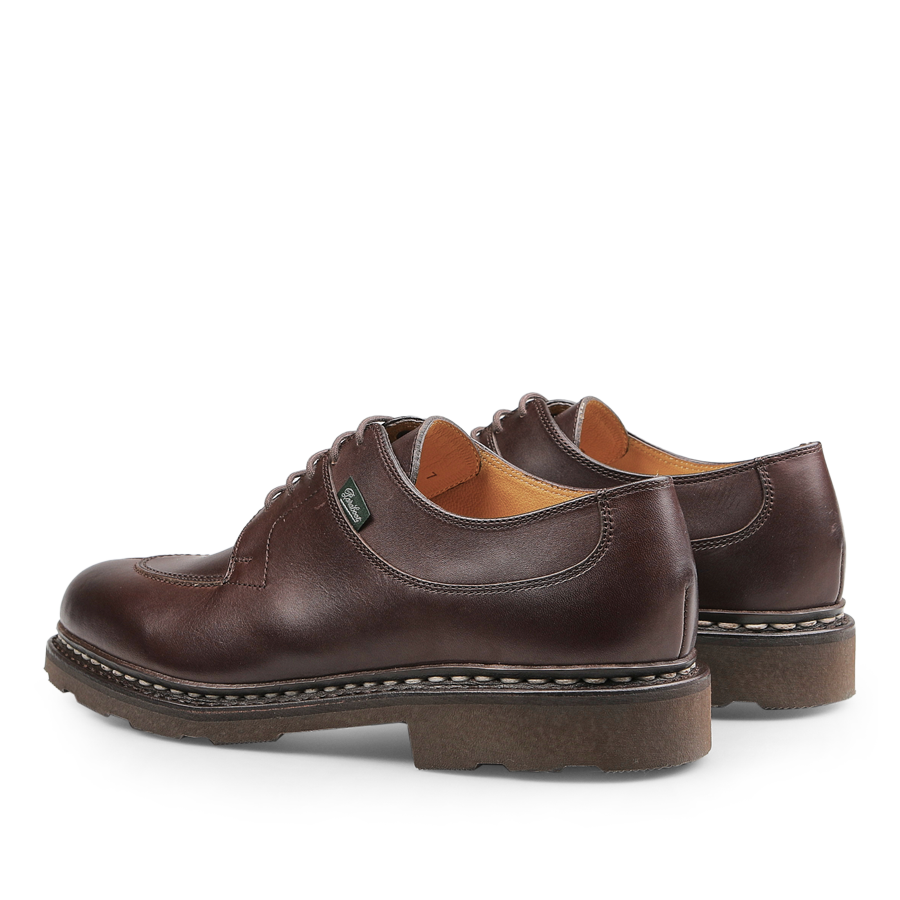 Pair of Paraboot's Brown Lis Cafe Avignon Split-Toe Derbies, featuring thick soles, viewed from the back and side.