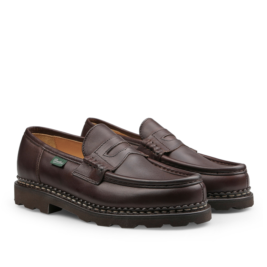 The Brown Lis Cafe Leather Reims Loafers by Paraboot feature chunky soles and visible stitching, expertly crafted with the brand's renowned Norwegian-welt construction.