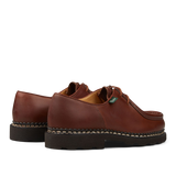 A pair of brown Lis Marron leather Paraboot shoes with thick black soles, shown in profile view against a transparent background.