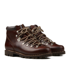 A pair of Marron Lis Ecorce Leather Avoriaz hiking boots by Paraboot featuring thick light brown laces and sturdy commando rubber soles.