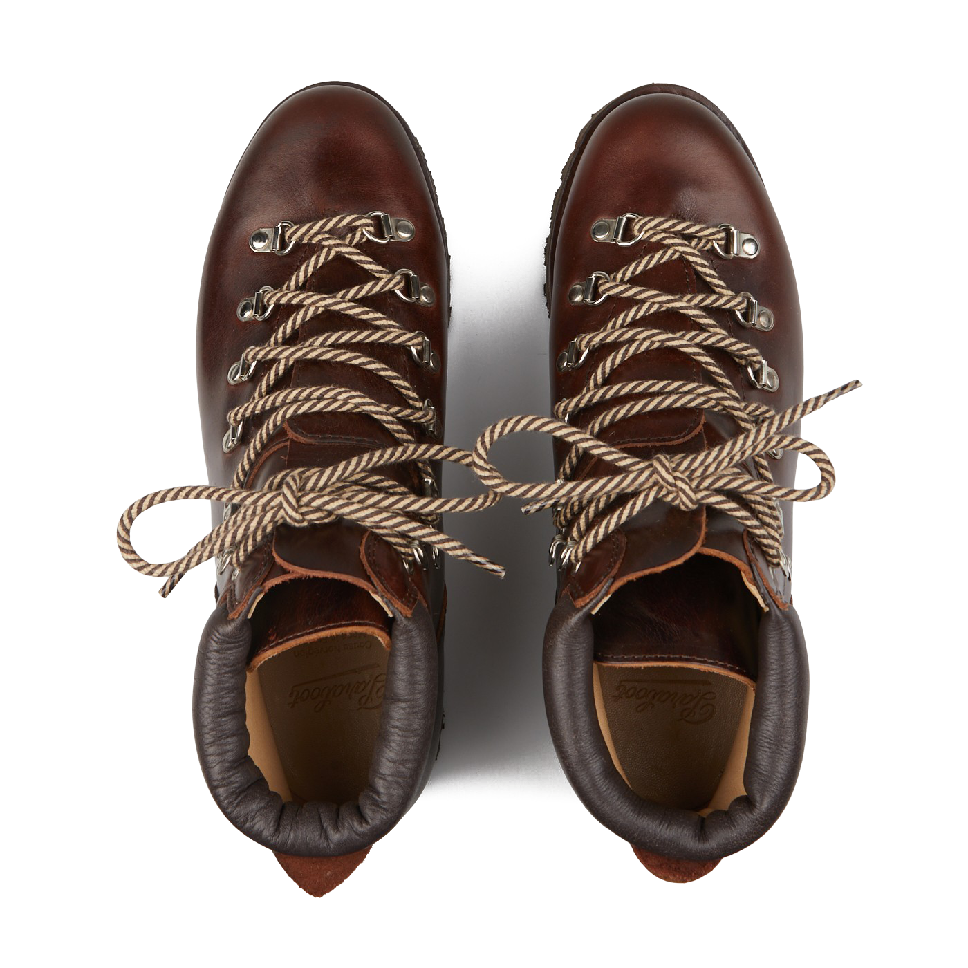 A pair of Paraboot Marron Lis Ecorce Leather Avoriaz Hiking Boots, featuring beige and brown laces and a durable commando rubber sole, is ideal for urban hikes when viewed from above.