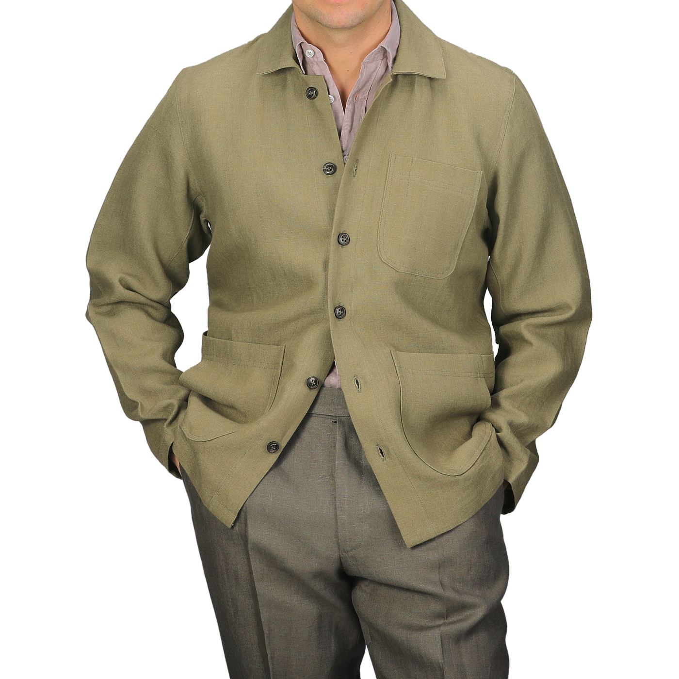 A person wears the Peregrine Khaki Green Linen Grange Shacket over a collared shirt and matching pants, with hands casually tucked in pockets.