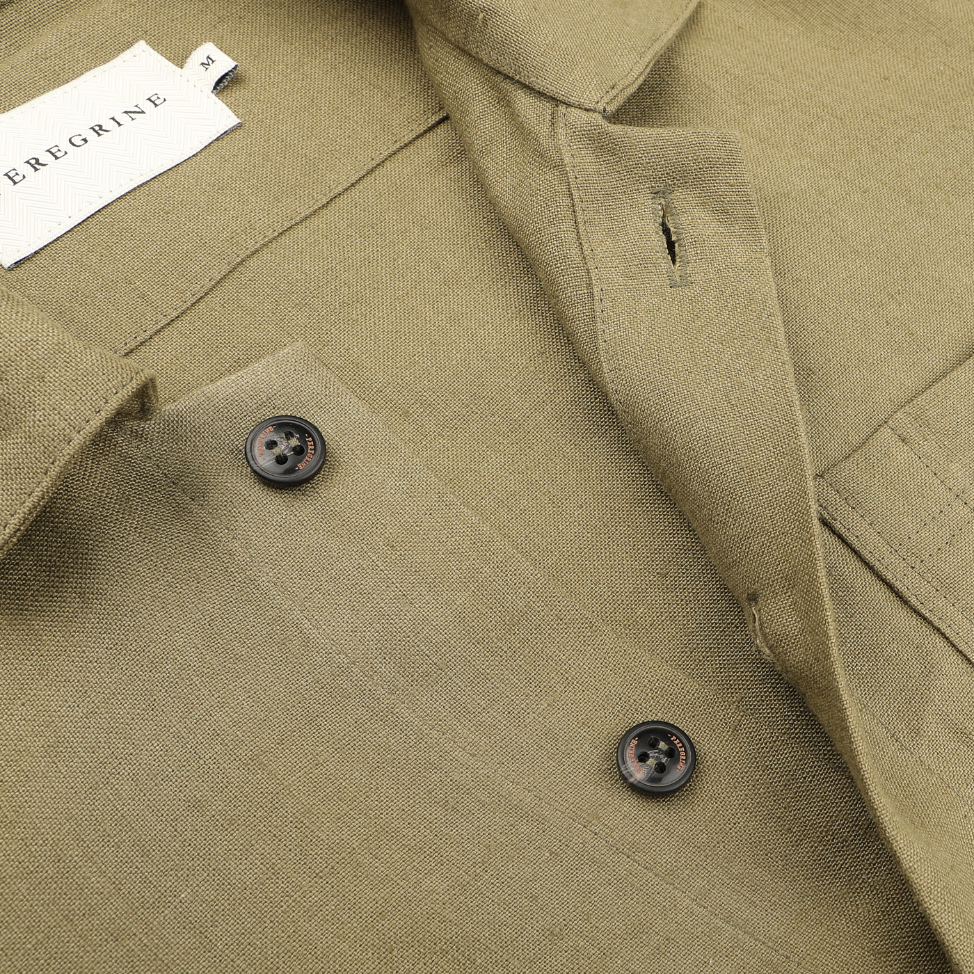 A close-up of the Khaki Green Linen Grange Shacket shows two buttons and a "Peregrine" tag.