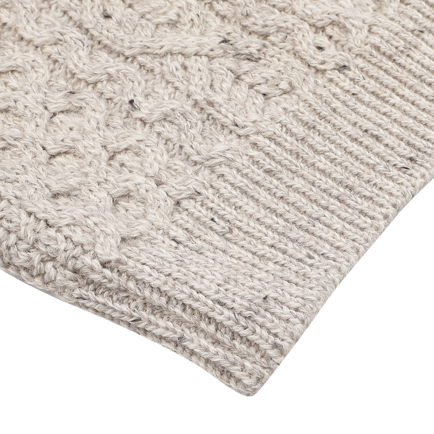 Close-up of the Skiddaw Beige Merino Wool Hudson Aran Jumper by Peregrine, featuring a textured Aran knit pattern that highlights the elegance of British knitwear.