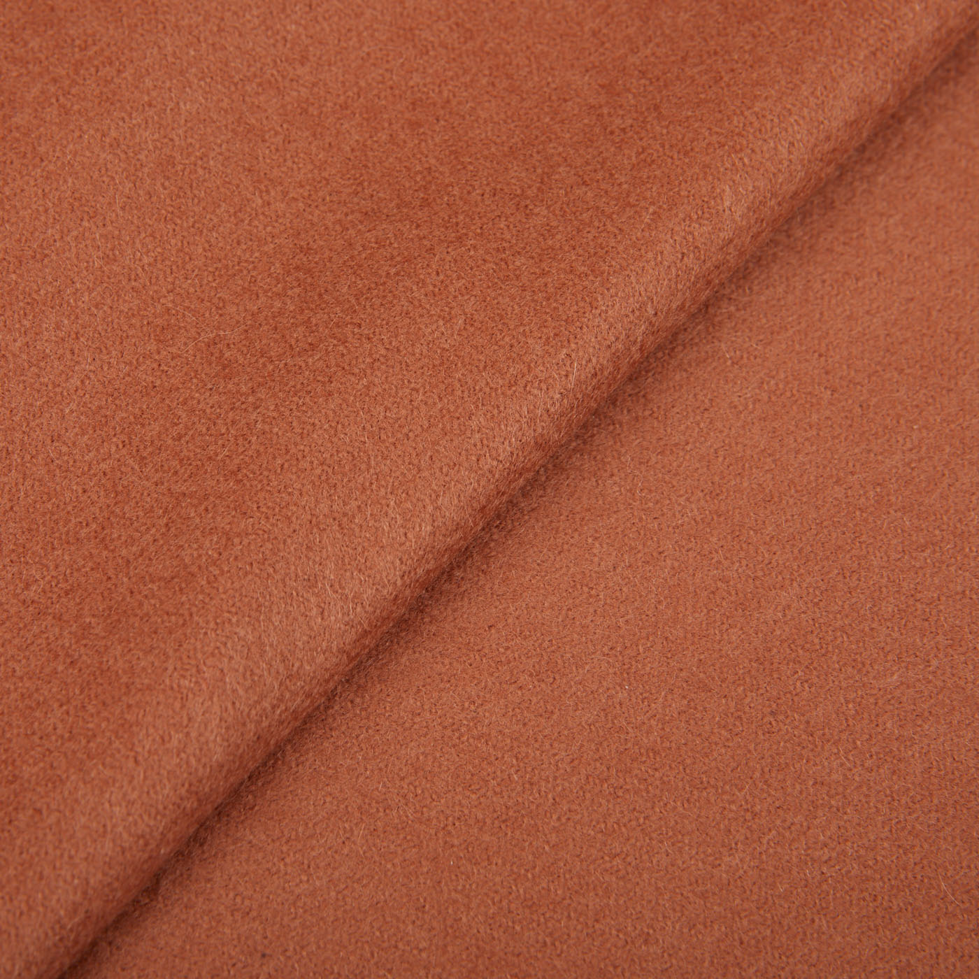 A close up image of a Muted Orange Cashmere Aeternum Scarf by Piacenza Cashmere.