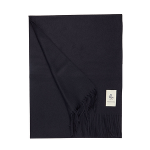 A Navy Blue Cashmere Aeternum Scarf with fringes on a white background.