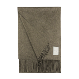 A folded moss green cashmere silk scarf with fringed endings and a white label from Piacenza Cashmere is displayed against a plain background, exuding a touch of sophistication.