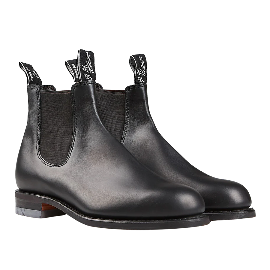 A pair of weather-resistant R.M. Williams Black Yearling Leather Wentworth G Chelsea boots with elastic side panels.