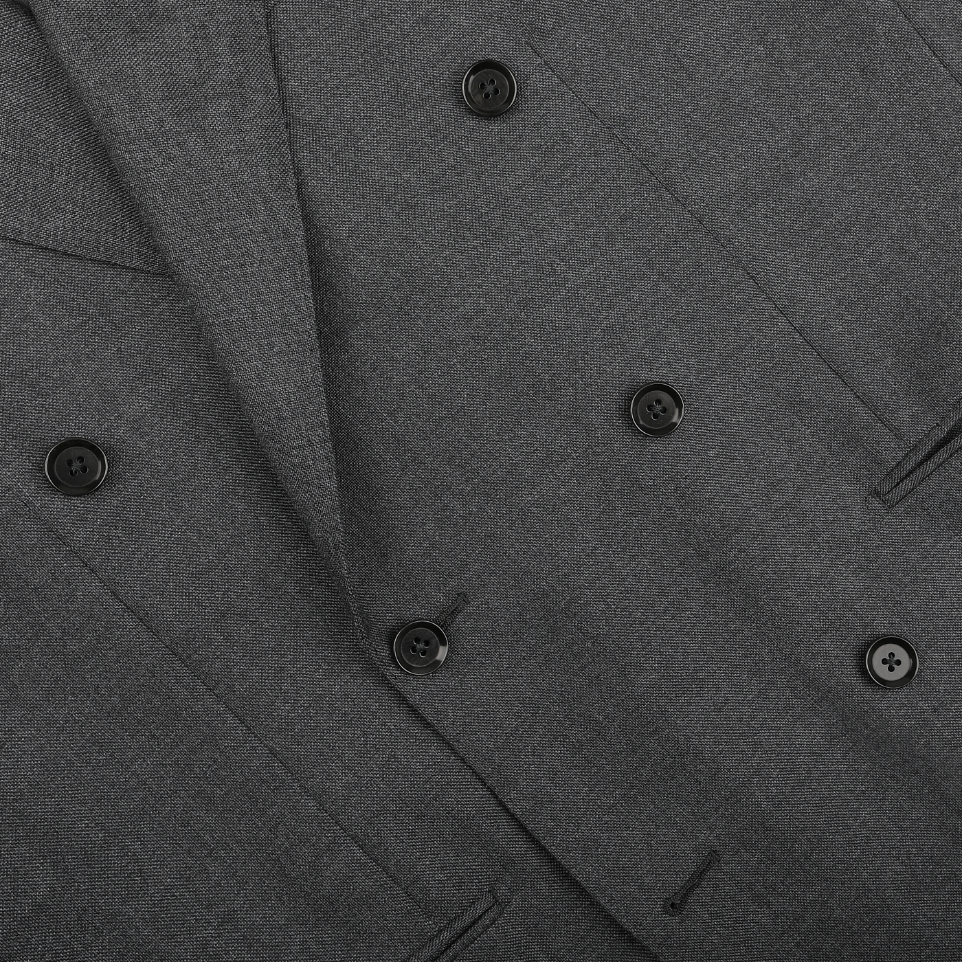 Close-up of the Grey Calm Twist Wool DB Suit from Ring Jacket, featuring a dark gray double-breasted design with black buttons.