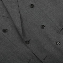 Close-up of the Grey Calm Twist Wool DB Suit from Ring Jacket, featuring a dark gray double-breasted design with black buttons.