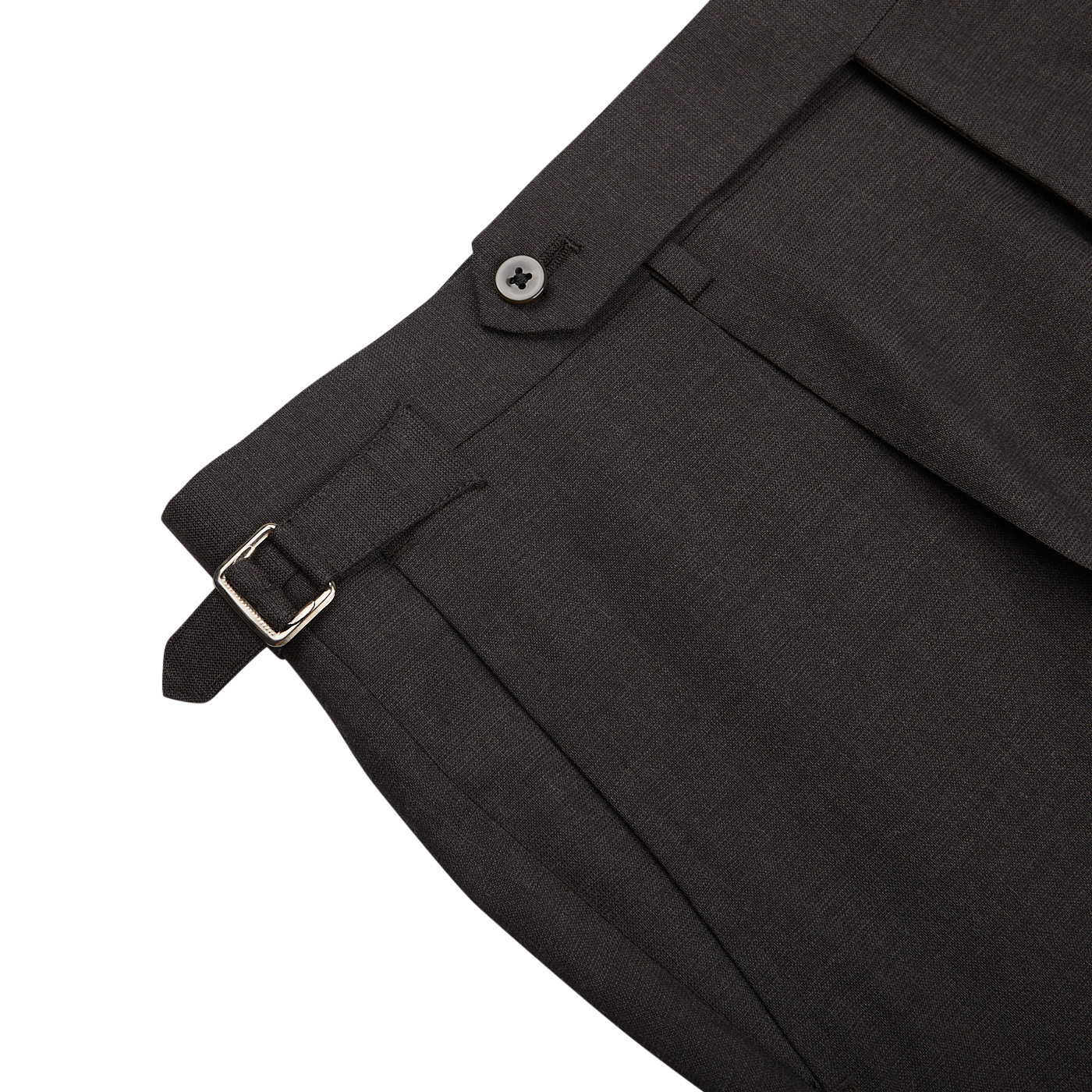Close-up of a Dark Brown High Twist Wool Suit trouser by Ring Jacket with a side adjuster and button detail on a light background.