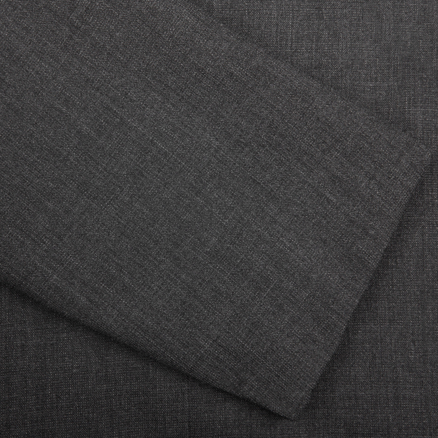 Close-up of a Ring Jacket dark grey high twist wool suit with a visible textured weave pattern.