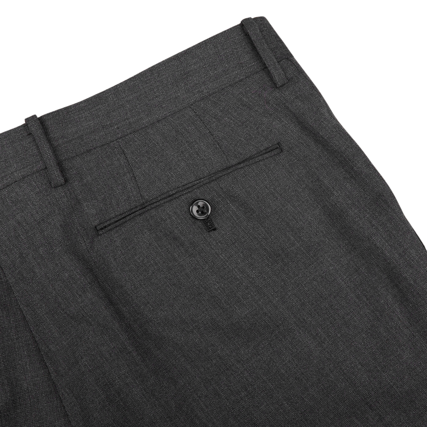 Close-up view of a Ring Jacket dark grey high twist wool suit waistband featuring belt loops and a buttoned rear pocket.