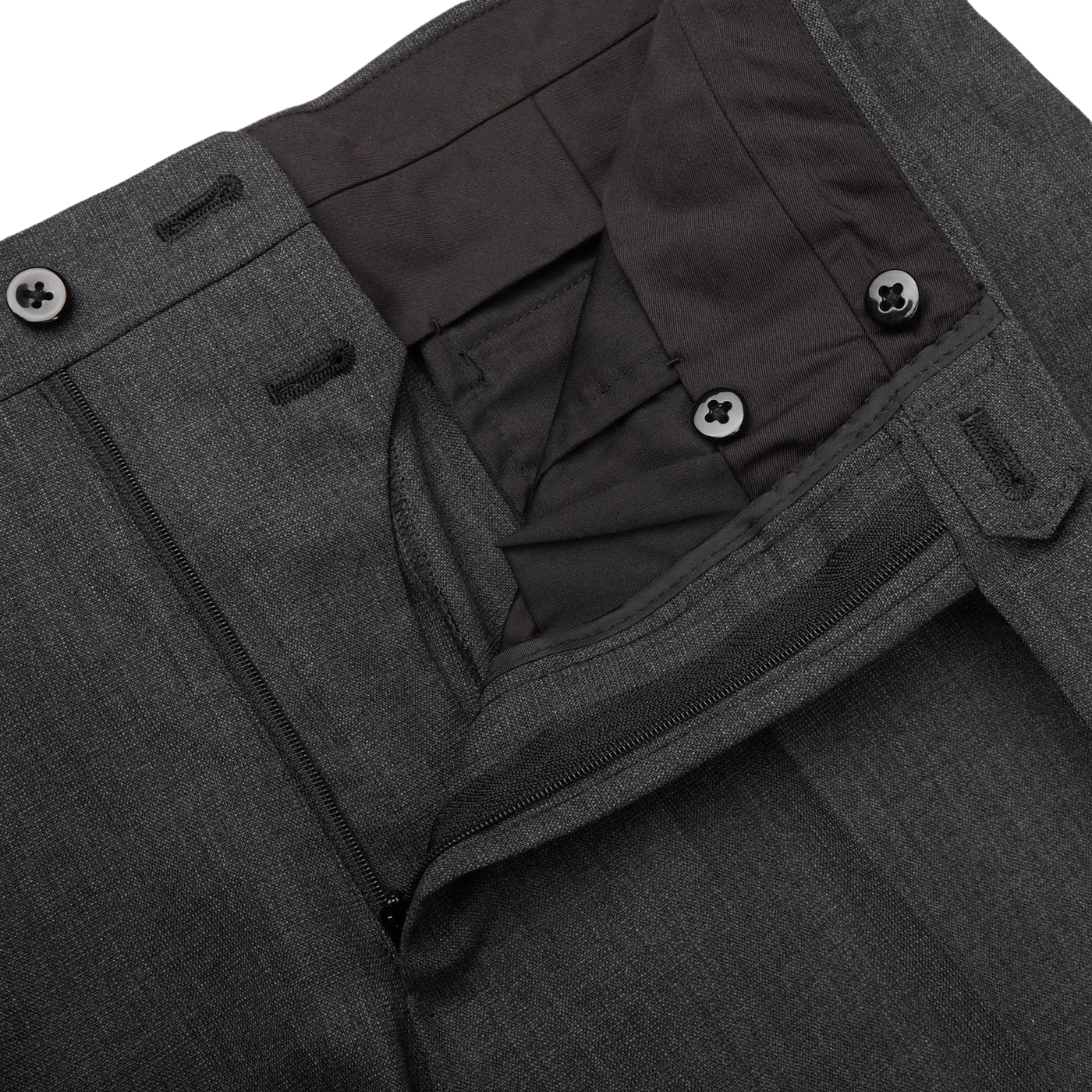 Close-up of a dark grey Ring Jacket High Twist Wool Suit men's trousers with buttons, zipper, and inner lining details.