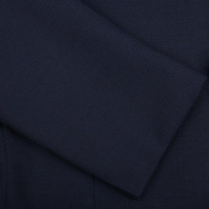 A close up of a Ring Jacket Navy High Twist Wool Suit made with fresco fabric.