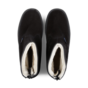A pair of original black slip-on Sanders shoes with white lining, viewed from above.