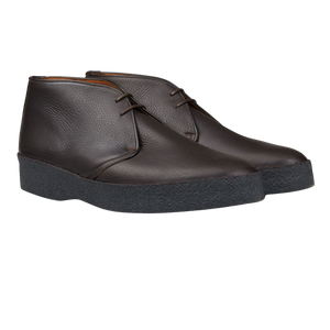 A pair of Dark Brown Savage Grain Hi Top Chukka Boots by Sanders with rubber crepe soles.