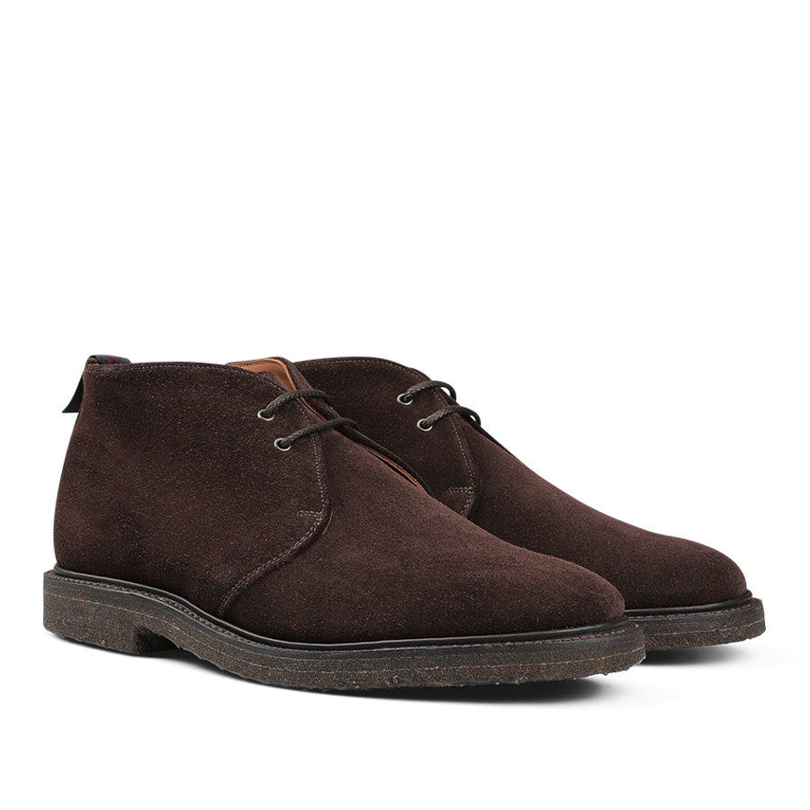 A pair of Sanders Mocha Reverse Suede Harry Chukka Boots, featuring laces and thick soles with expert Goodyear welt construction, presented against a white background.