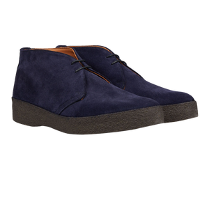 A pair of Sanders navy blue suede hi top boots with rubber crepe soles.