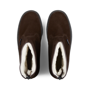A pair of brown suede Sanders Pinner curling boots with white wool lining viewed from above.