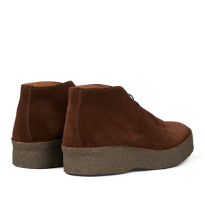 A pair of Polo Snuff Suede Hi Top Boots by Sanders with a rubber crepe sole on a transparent background.