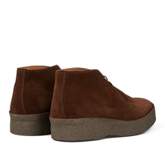 A pair of Polo Snuff Suede Hi Top Boots by Sanders with a rubber crepe sole on a transparent background.