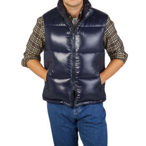 A man wearing a Save The Duck Dark Blue Nylon Ailantus Padded Gilet for protection.