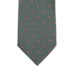 A Bottle Green Printed Medallion Silk Tie by Seaward & Stearn, featuring handmade craftsmanship with red and white circular medallion designs.