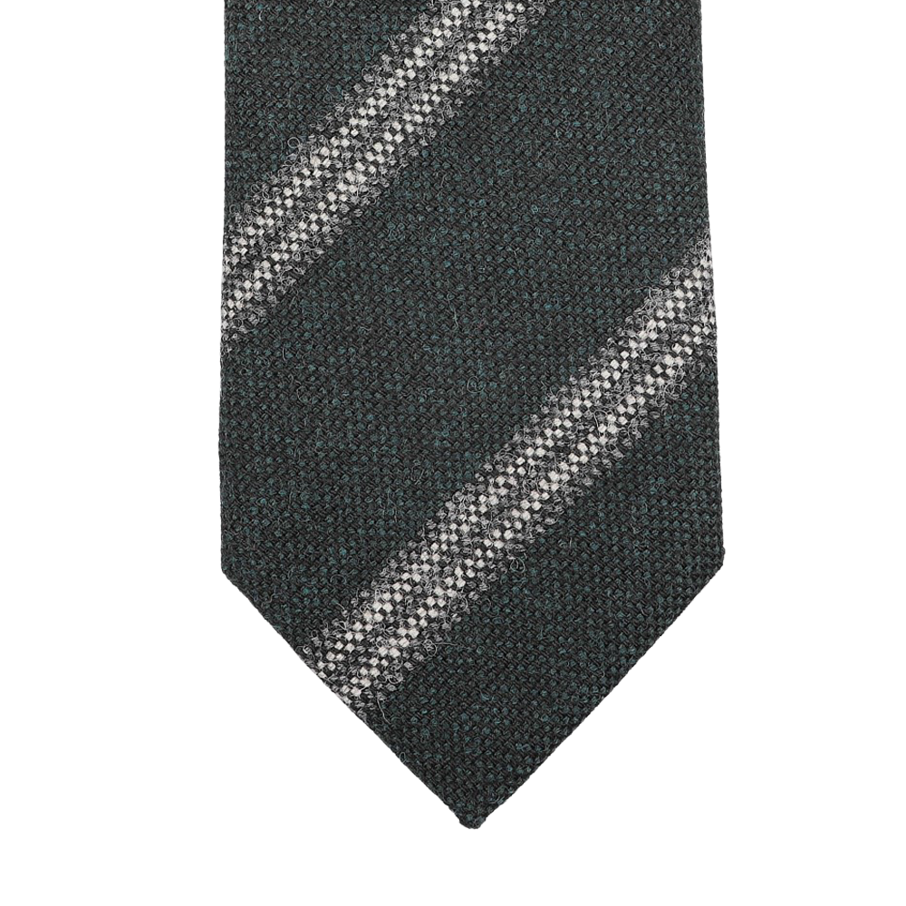 The Dark Green Striped Wool Tie by Seaward & Stearn is handmade in England and exudes quality and style with its dark green textured appearance and a diagonal light-colored stripe.