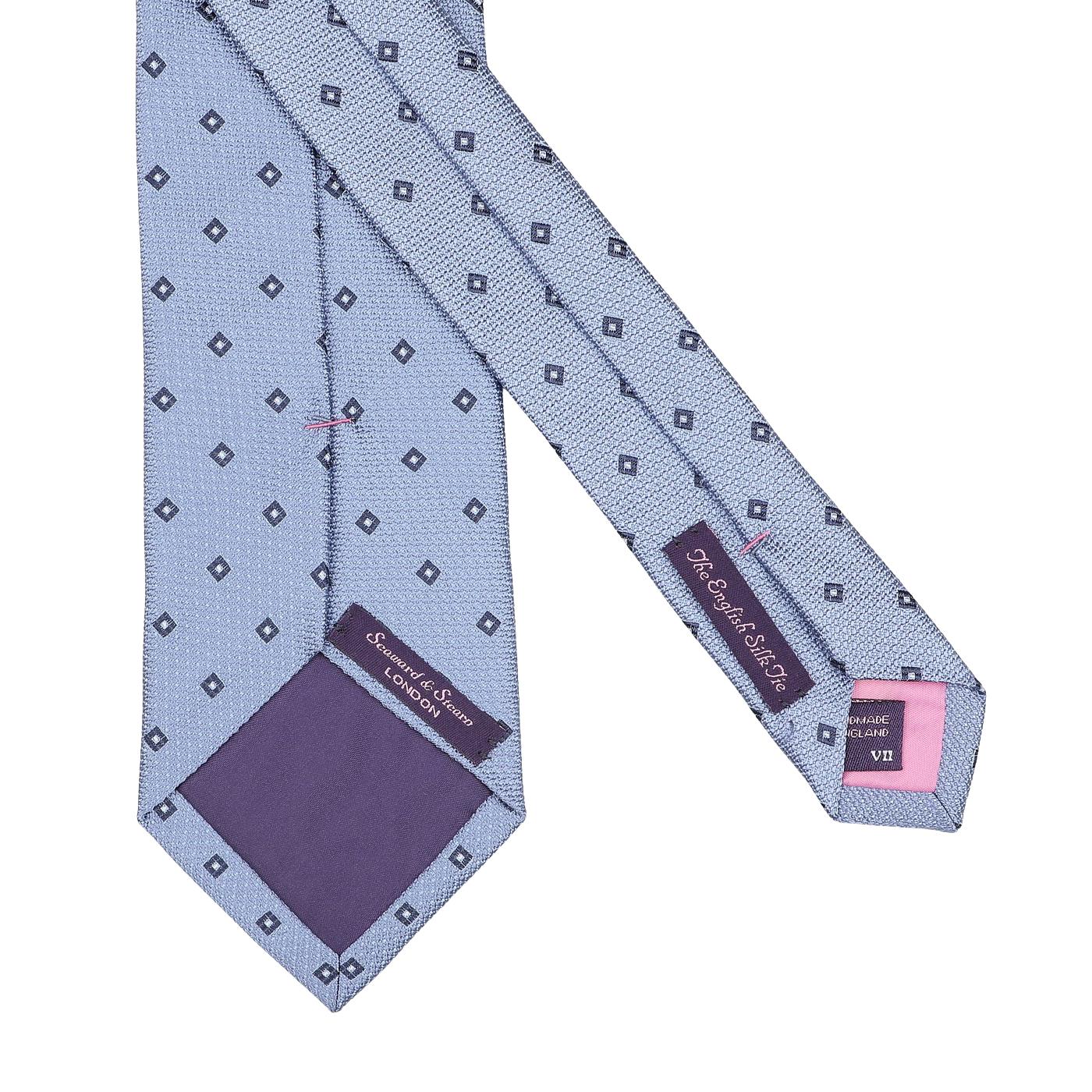 A Light Blue Diamond Woven Silk Tie by Seaward & Stearn, crafted in England from silk, features diamond patterns, a purple inner lining, and has the brand labels on the underside.